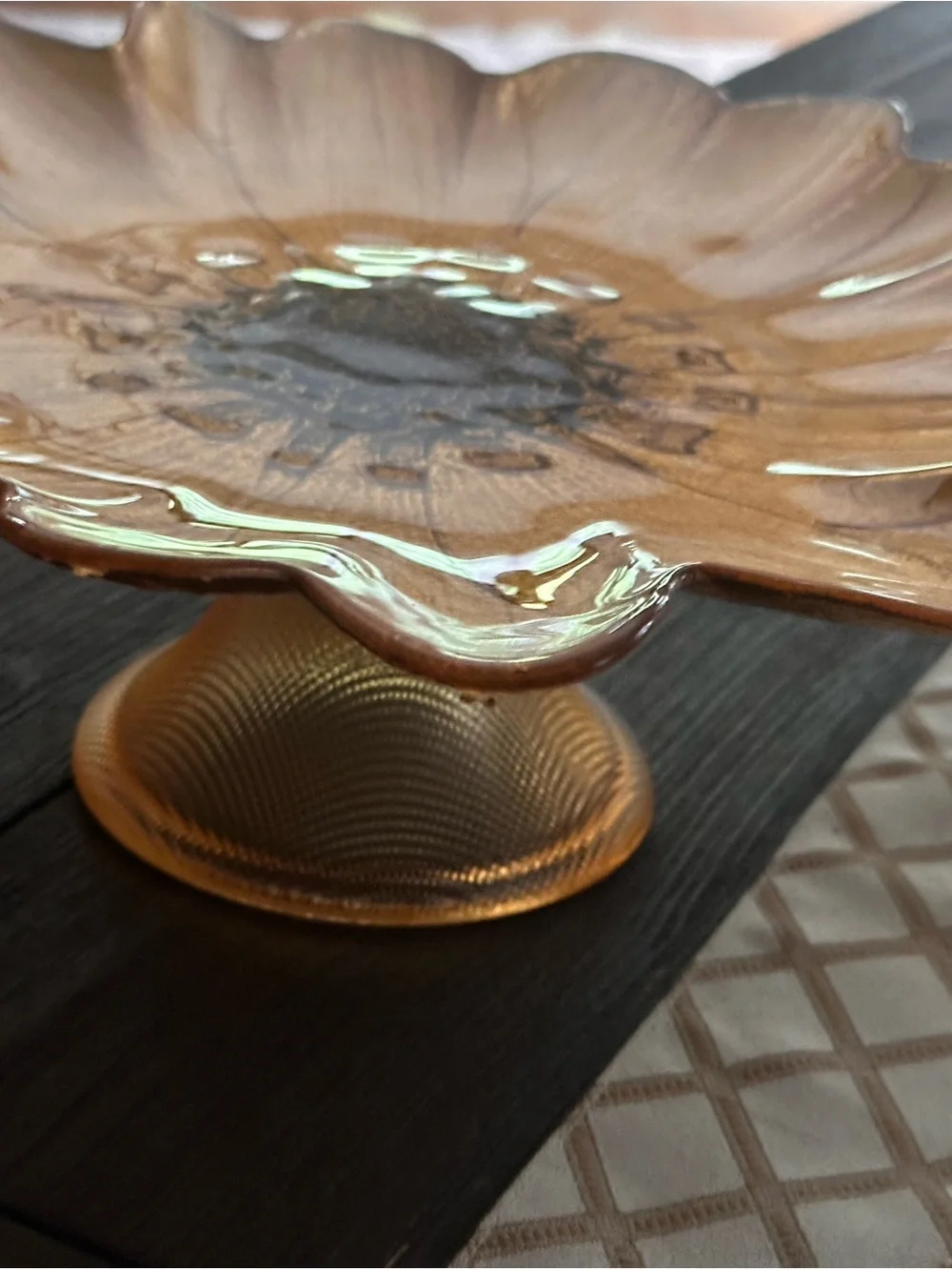 Gold sunflower glass decorative plate on a pedestal stand